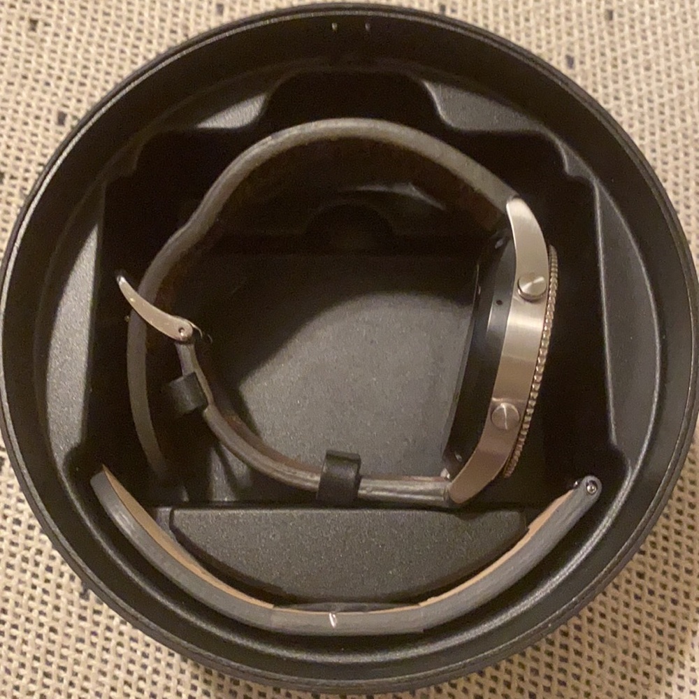 Silver Samsung Gear series 3 watch with black strap